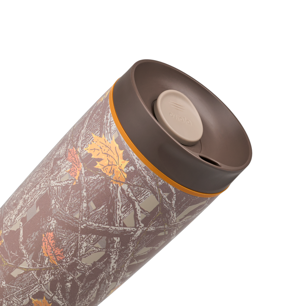 Owala SmoothSip Slider 20oz in Out of Sight, angled lid view showing dark brown lid with tan slider button and sip hole, orange accent ring at the lid base